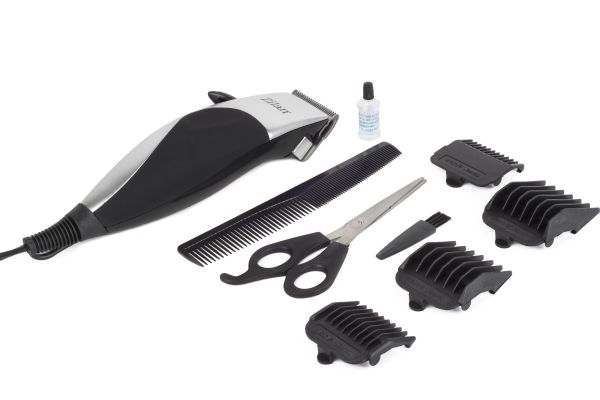 
					Машинка для стрижки волосся (4 насадки, ножиці та розчіска) Floria ZLN0443, 9W